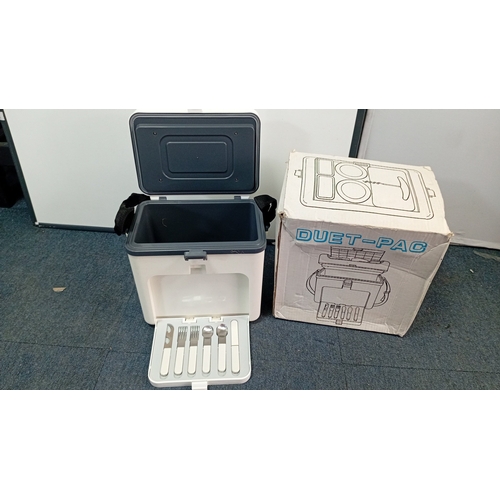 39 - DUET-PAC moulded plastic picnic hamper with shoulder strap; fitted with lidded compartment and lift-... 