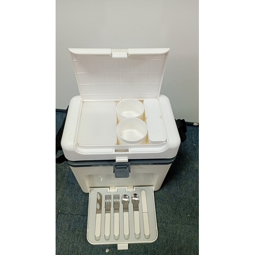 39 - DUET-PAC moulded plastic picnic hamper with shoulder strap; fitted with lidded compartment and lift-... 
