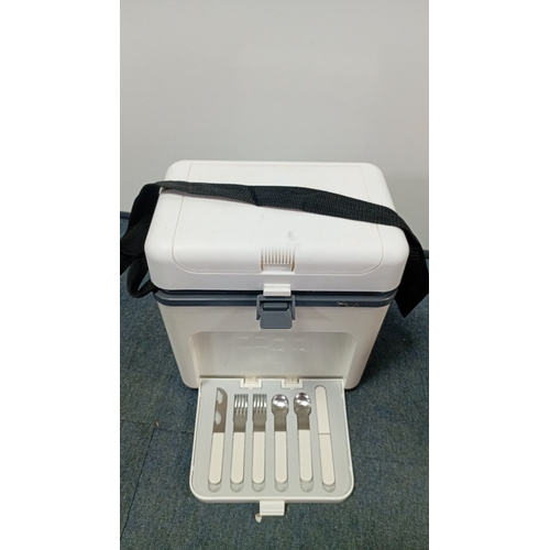 39 - DUET-PAC moulded plastic picnic hamper with shoulder strap; fitted with lidded compartment and lift-... 