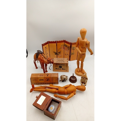 42 - A quantity of assorted decorative items including a jointed artist’s lay figure, miniature folding s... 
