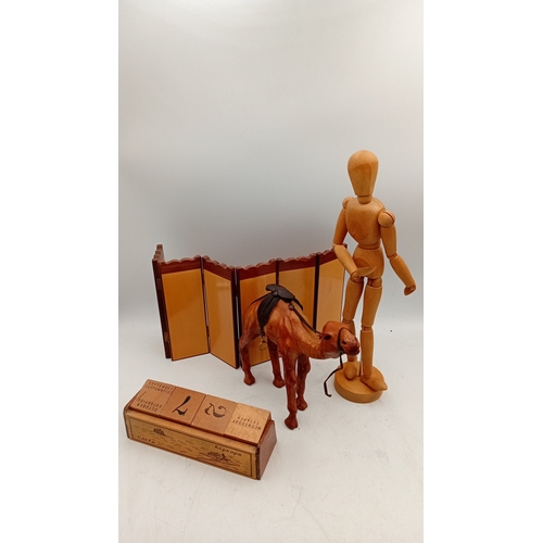 42 - A quantity of assorted decorative items including a jointed artist’s lay figure, miniature folding s... 