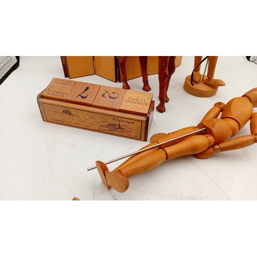 42 - A quantity of assorted decorative items including a jointed artist’s lay figure, miniature folding s... 