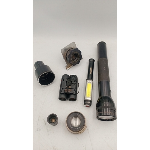 43 - A group of optical and lighting equipment, including a Mag-Lite torch, Neo inspection lamp, compact ... 