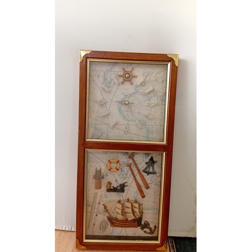 44 - Modern wall clock with applied maritime shadowbox panel beneath, both set against a printed chart ba... 