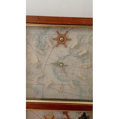44 - Modern wall clock with applied maritime shadowbox panel beneath, both set against a printed chart ba... 