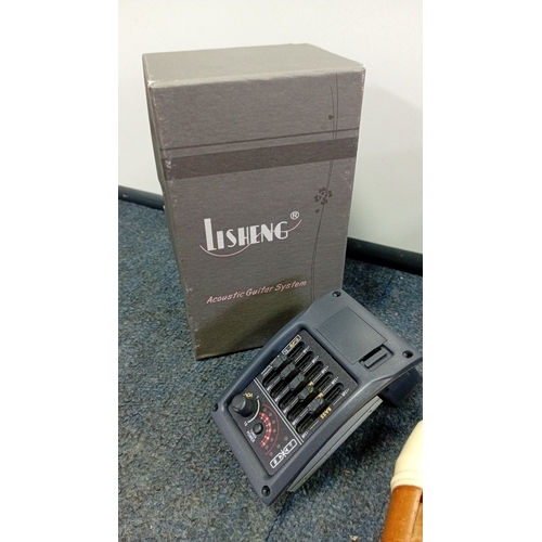 89 - A group of modern musical accessories comprising a LiSheng acoustic guitar preamp/equaliser system, ... 