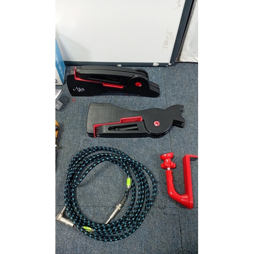 89 - A group of modern musical accessories comprising a LiSheng acoustic guitar preamp/equaliser system, ... 
