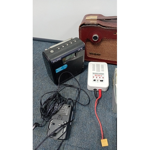 90 - A quantity of assorted domestic electronics and accessories, including a Pure One Mini radio, cased ... 