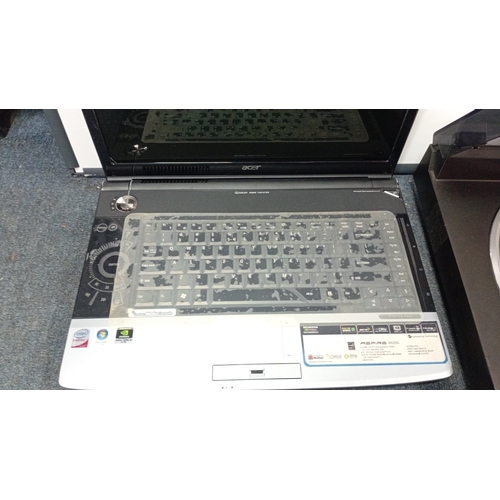 93 - A mixed group of consumer electronics and accessories, including Acer and Lenovo laptop computers, a... 