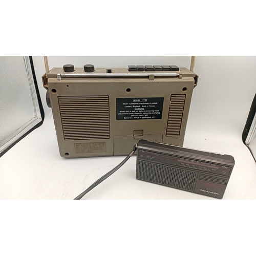 97 - A group of portable audio equipment comprising a Ferguson 3-band radio cassette recorder, model 3T21... 