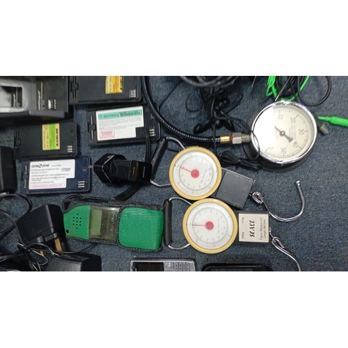 67 - A quantity of late 20th/early 21st century mobile telephones and telecommunications accessories, inc... 
