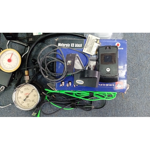 67 - A quantity of late 20th/early 21st century mobile telephones and telecommunications accessories, inc... 