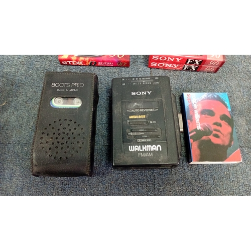 68 - A group of late 20th century personal audio equipment comprising an ALBA MW/FM clock radio with orig... 
