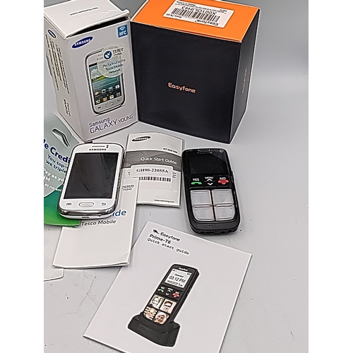 70 - A mixed group of mobile telephones including Apple iPhone 6s in box, Samsung Galaxy Young with Tesco... 