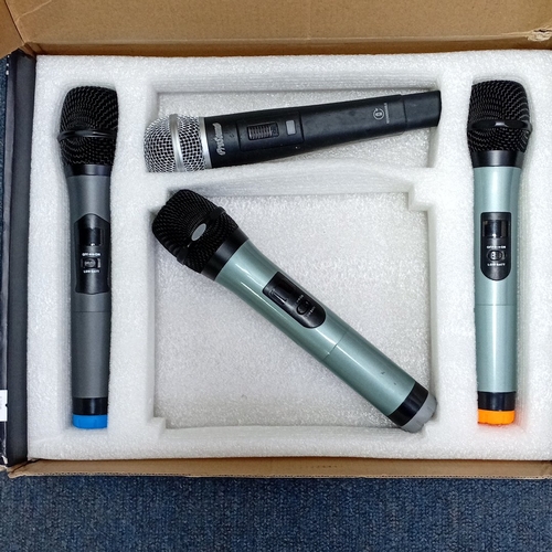71 - KGM twin-channel UHF wireless microphone system, comprising four handheld transmitters with mesh hea... 