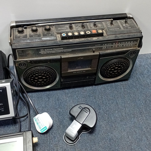 74 - A group of portable audio equipment comprising a National Panasonic FM/AM cassette recorder, a Sony ... 