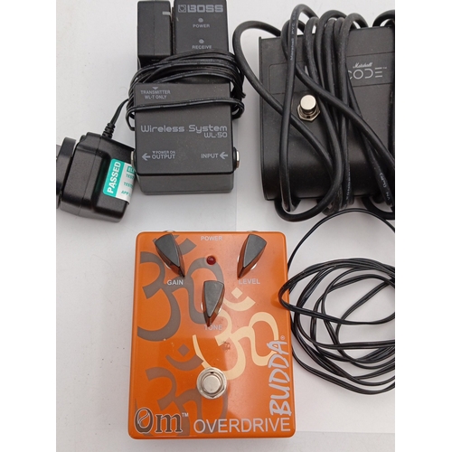 81 - A group of guitar effects and accessories comprising a Boss Wireless System WL-50 receiver with tran... 