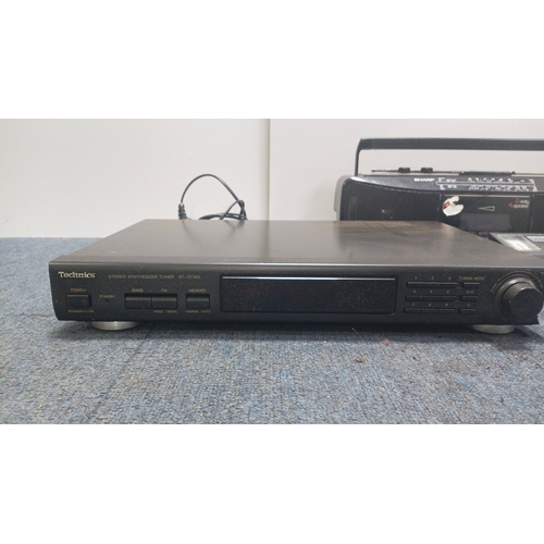 85 - A group of consumer electronics including a Technics stereo synthesizer tuner ST-GT350 pat tested an... 