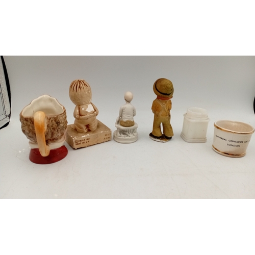 49 - A group of vintage novelty wares, comprising a character head mug, a crackle-glazed corporate match ... 
