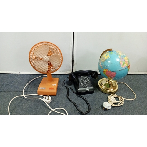 52 - A group of late 20th century domestic items comprising a Sona orange plastic table fan with mesh gua... 