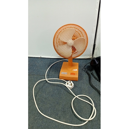 52 - A group of late 20th century domestic items comprising a Sona orange plastic table fan with mesh gua... 