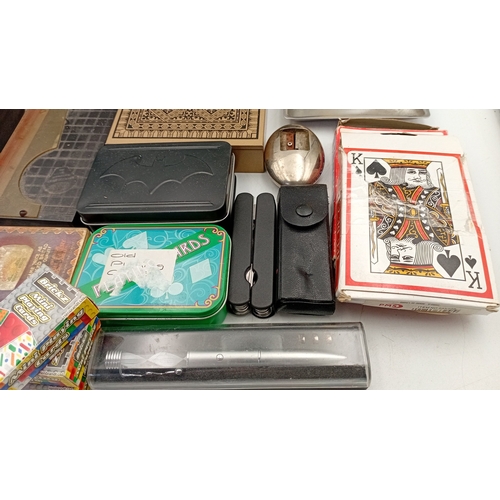 54 - A mixed lot of small ephemera and desk accessories, including a guillotine paper trimmer, playing ca... 