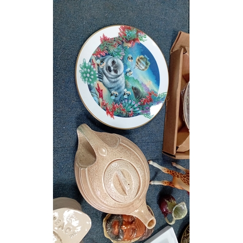 57 - A mixed group of decorative ceramics and collectables including a boxed Hamilton Collection ‘Cabin F... 