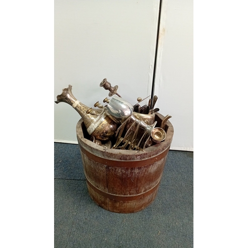 61 - A mixed lot of silver-coloured metalware and flatware, including a lidded teapot, goblets, candlesti... 
