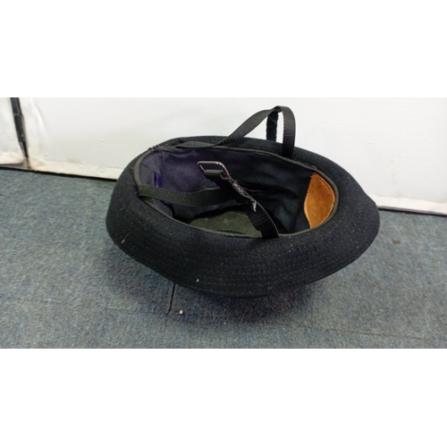 62 - British police custodian helmet of domed black felted construction, with blue-and-white chequered ba... 