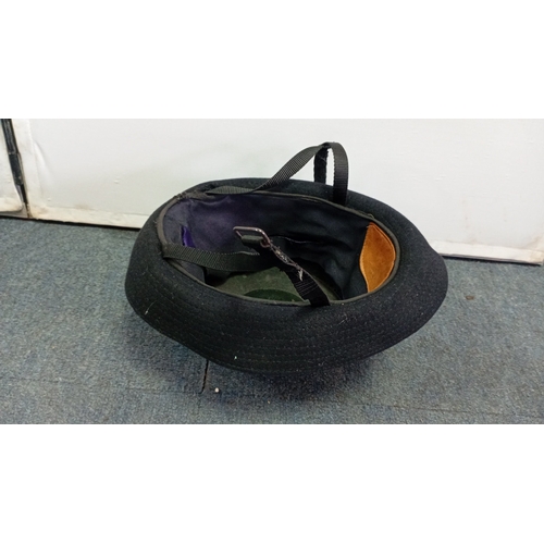 62 - British police custodian helmet of domed black felted construction, with blue-and-white chequered ba... 