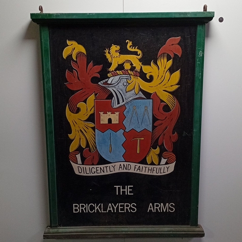 106 - A vintage painted double sided wooden pub hanging signboard, with green moulded frame and iron suspe... 