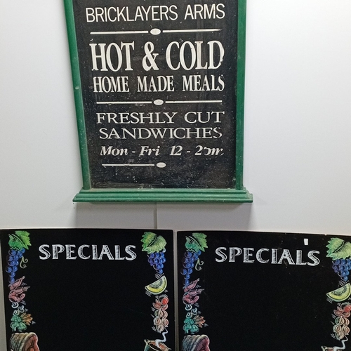 107 - A group of pub and catering chalkboards, comprising a Greenalls “The Bricklayers Arms” menu board in... 