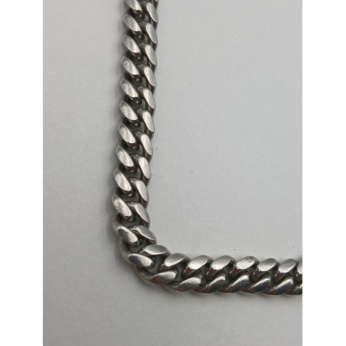 401 - A chunky stamped 925 silver cuban link necklace. Length 22 inches