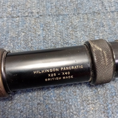 186 - A group of optical field instruments including a Hilkinson Pancratic x25–x40 British-made telescope,... 