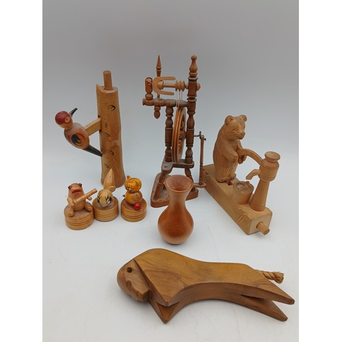 47 - A quantity of assorted decorative objects including, a working carved wood spinning wheel model, an ... 