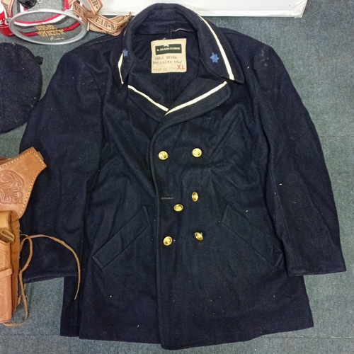 61 - An assortment of vintage-style accessories including a navy wool double-breasted pea coat, a black r... 