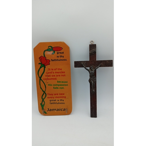 64 - A collection of devotional and souvenir items including polychrome resin figures, a wooden crucifix,... 
