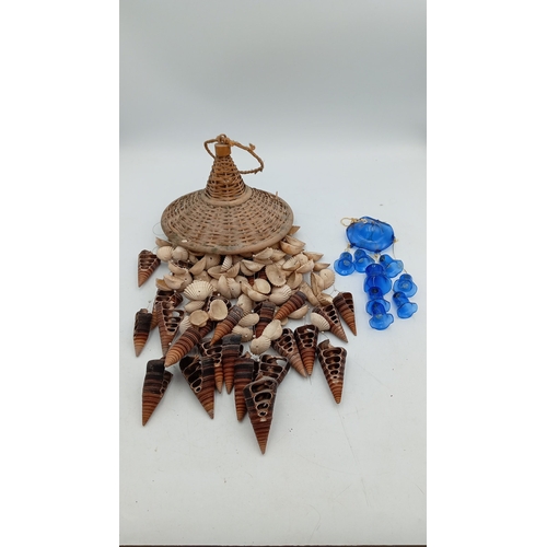 64 - A collection of devotional and souvenir items including polychrome resin figures, a wooden crucifix,... 