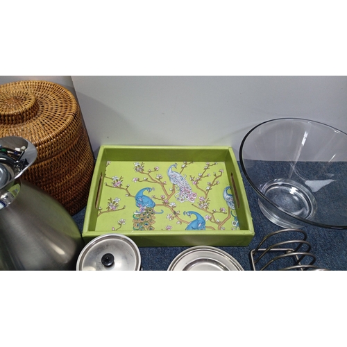 65 - A quantity of assorted domestic wares including a wicker picnic hamper, stainless steel vacuum jug, ... 