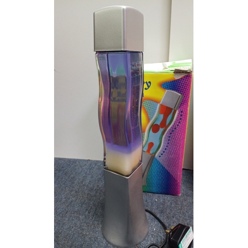 66 - A pair of “Groovy Motion Lamp” table lamps, each with a square-section base and cap framing a waiste... 