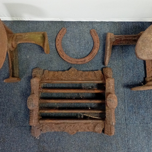 68 - A group of Victorian cast-iron fireplace fittings, comprising a pierced and foliate relief-front gra... 
