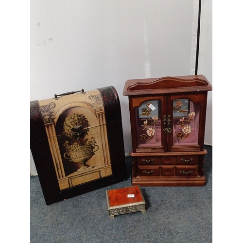 72 - A group of decorative caskets comprising a painted wooden wine carrier with hinged cover and compart... 