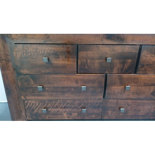 118 - Contemporary hardwood chest of drawers of rectangular form, fitted with an arrangement of graduated ... 