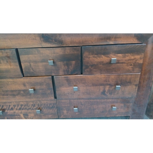 118 - Contemporary hardwood chest of drawers of rectangular form, fitted with an arrangement of graduated ... 