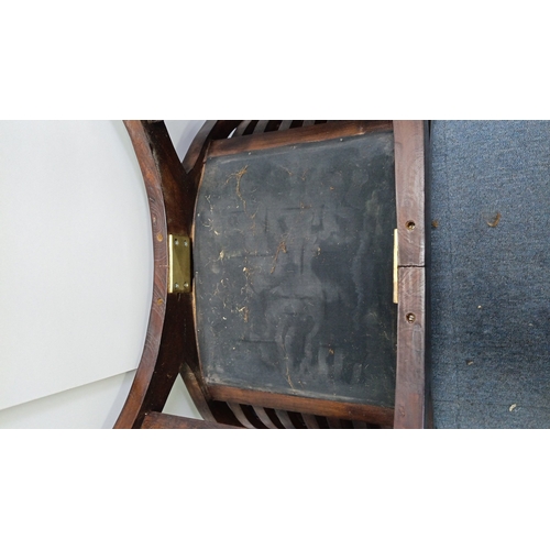 119 - A vintage curved mahogany bench, the bowed ends with arched slatwork rising to cylindrical crest rai... 