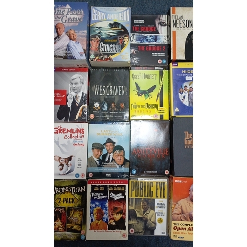 75 - A quantity of DVD box sets and feature films, chiefly television and cinema titles including Taken, ... 