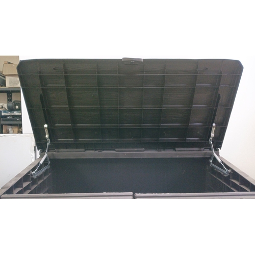 77 - Large moulded plastic storage deck box with hinged lid, panelled exterior, central lock-hasp with re... 