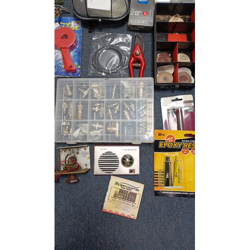 81 - A quantity of hobbyist and workshop accessories including plastic compartment organisers of small fi... 