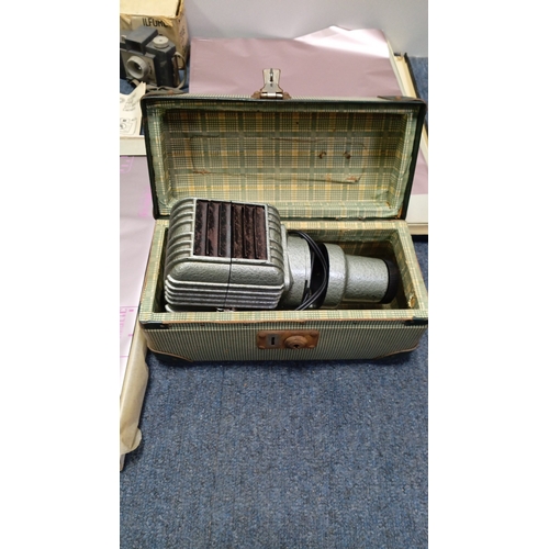 84 - A collection of photographic equipment including a Halina 35mm compact camera in box, an Ilford Pixi... 