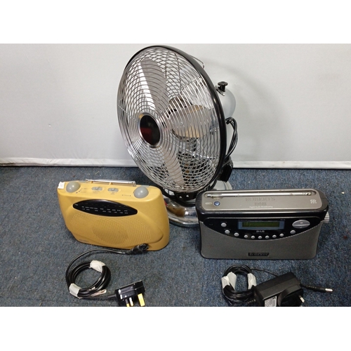 85 - A group of domestic electricals comprising a chrome-effect oscillating table fan with wire guard, He... 